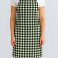 Green gingham cotton apron on model