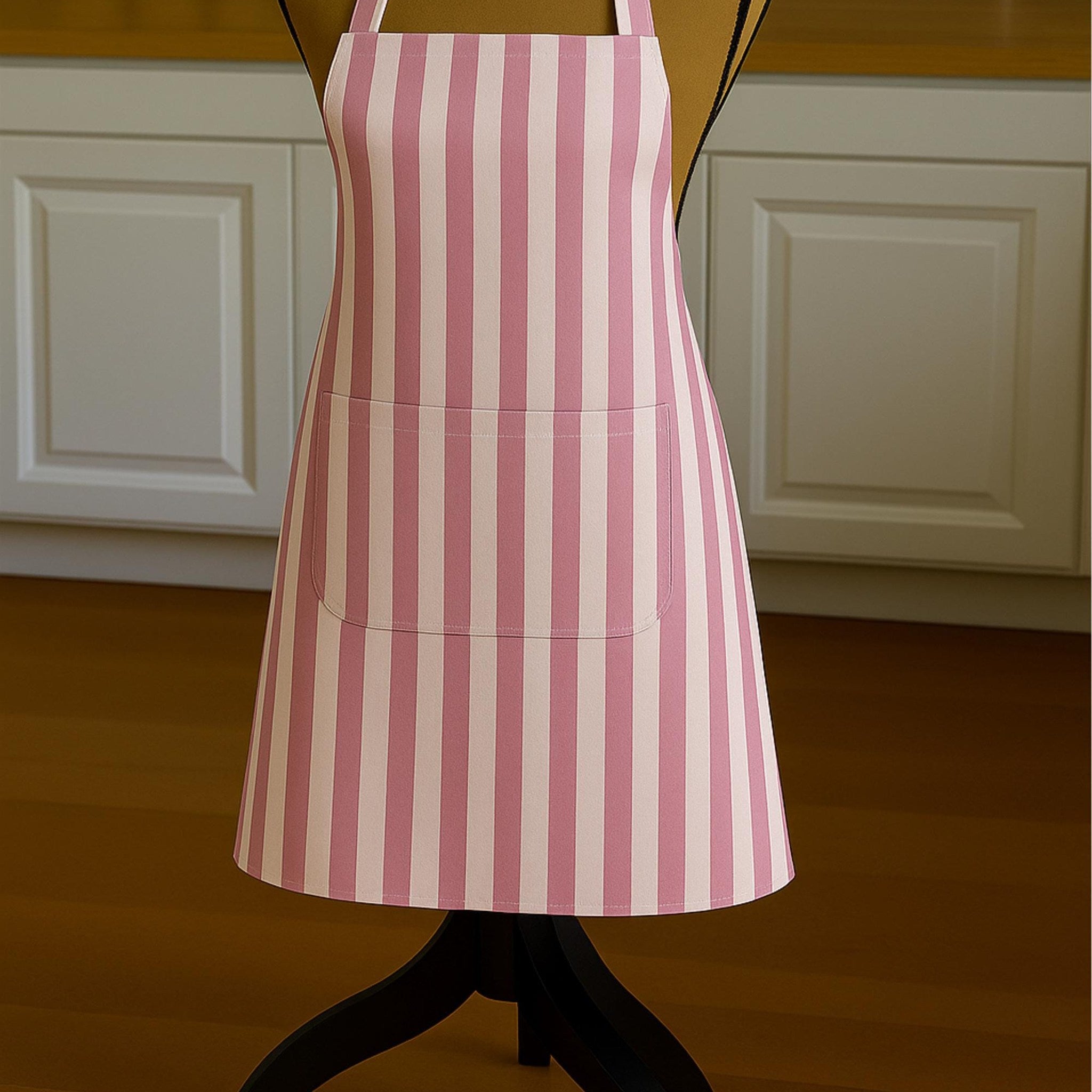 Pink striped apron on mannequin