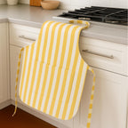 Yellow striped apron draped on counter