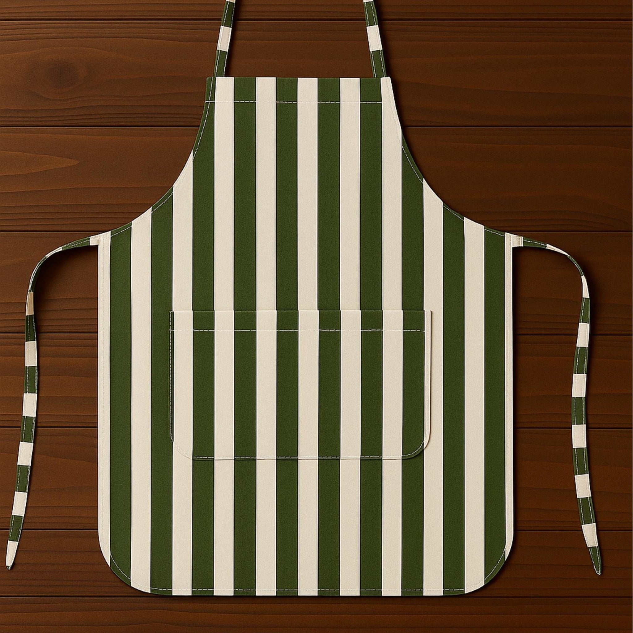Green striped apron flat lay