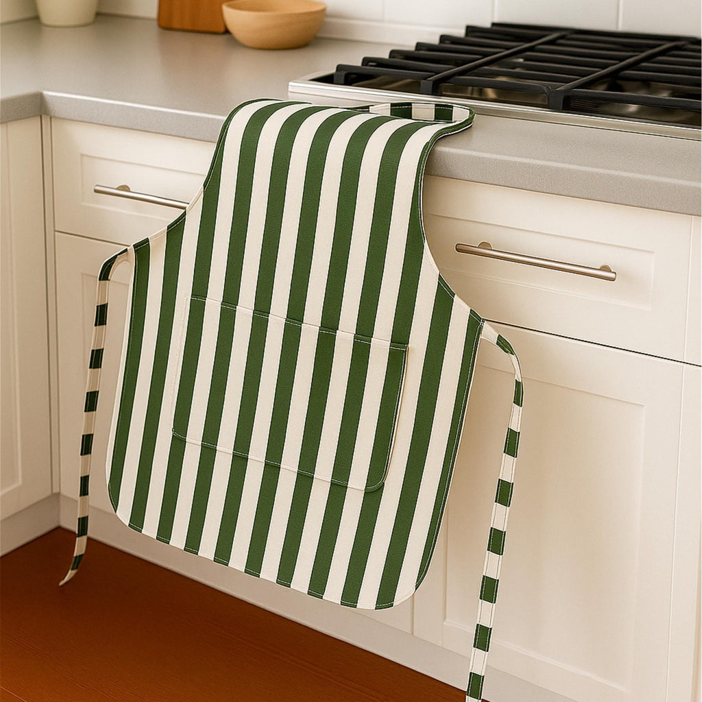 Green striped apron draped on counter