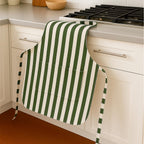Green striped apron draped on counter