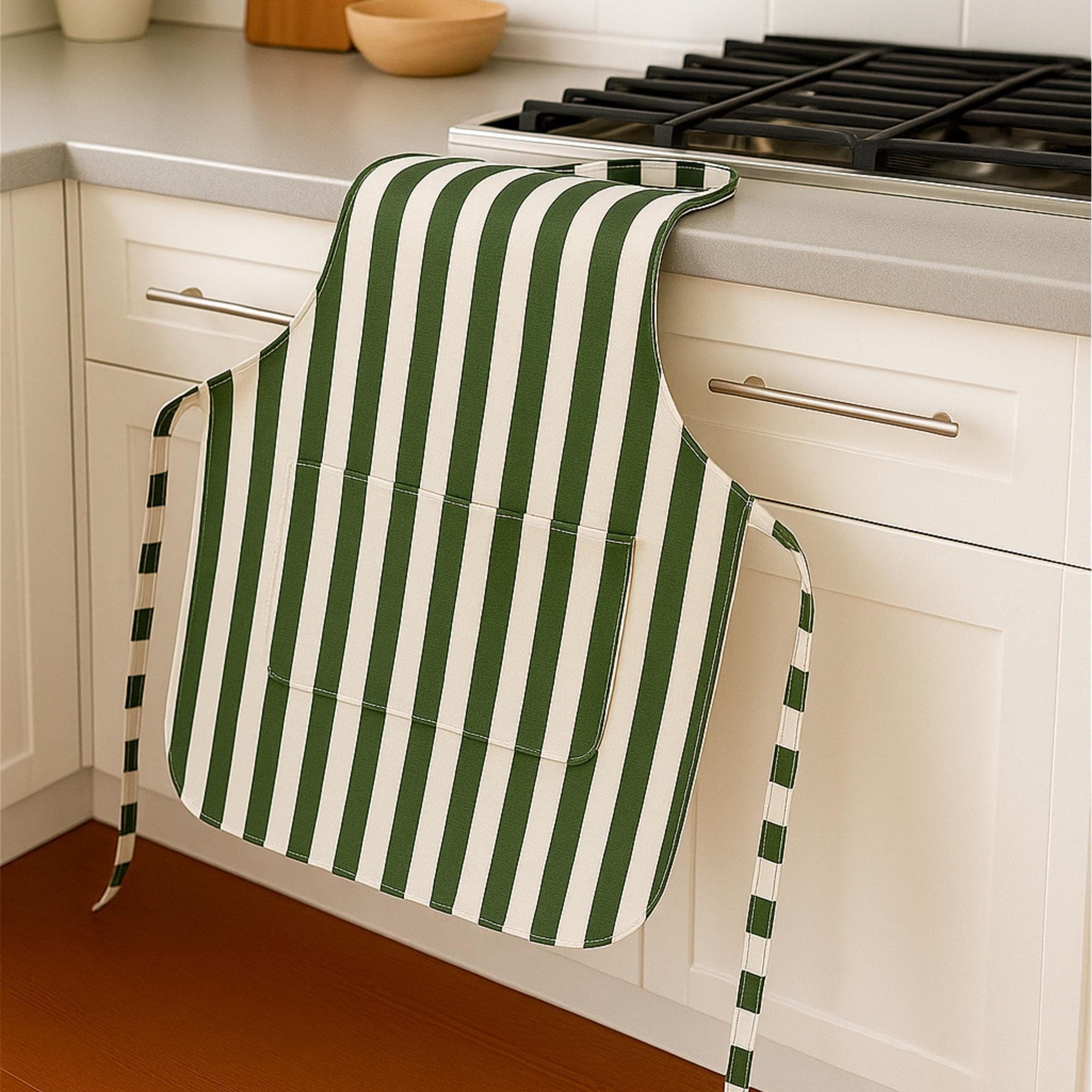 Green striped apron draped on counter