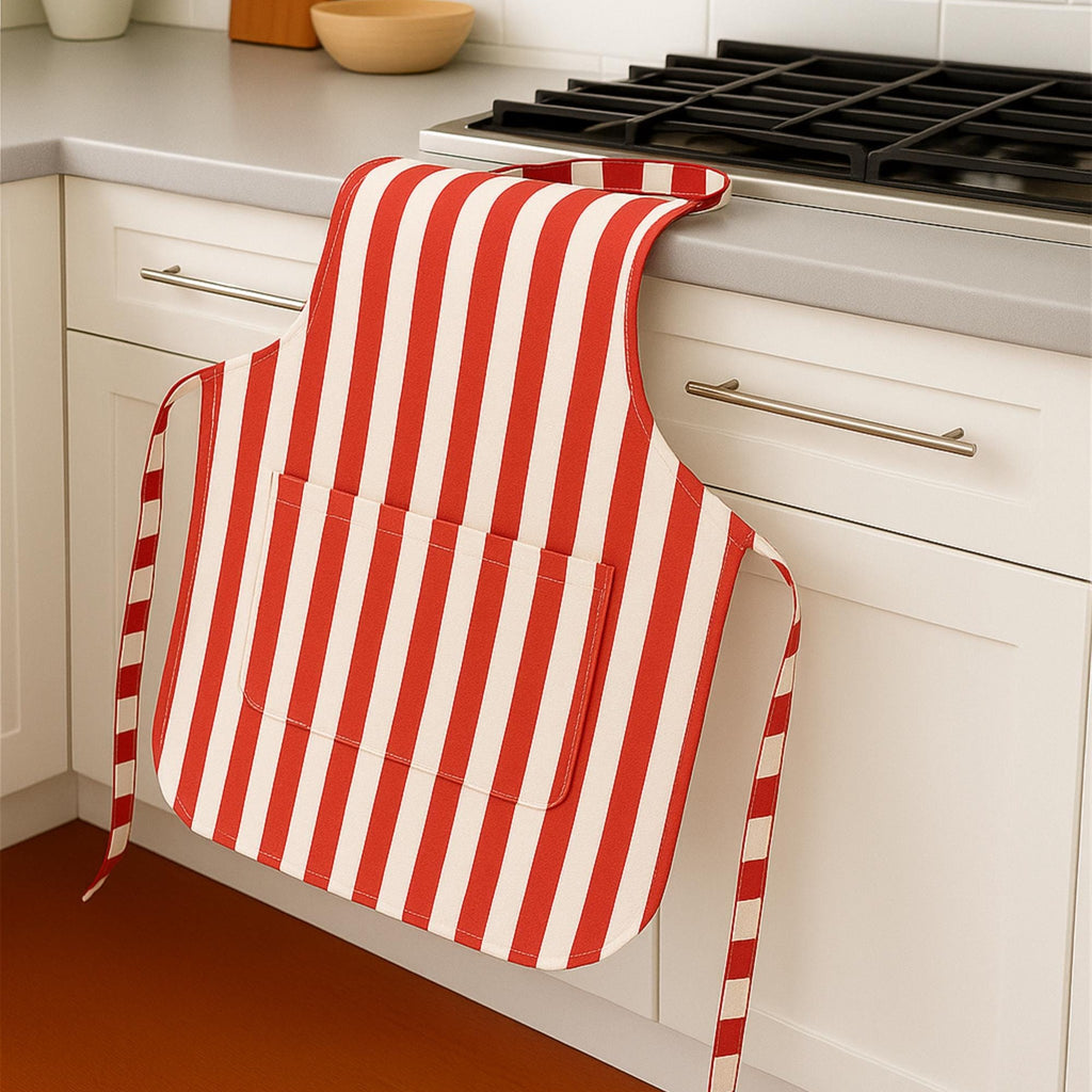 Red striped apron draped on counter