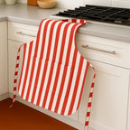 Red striped apron draped on counter