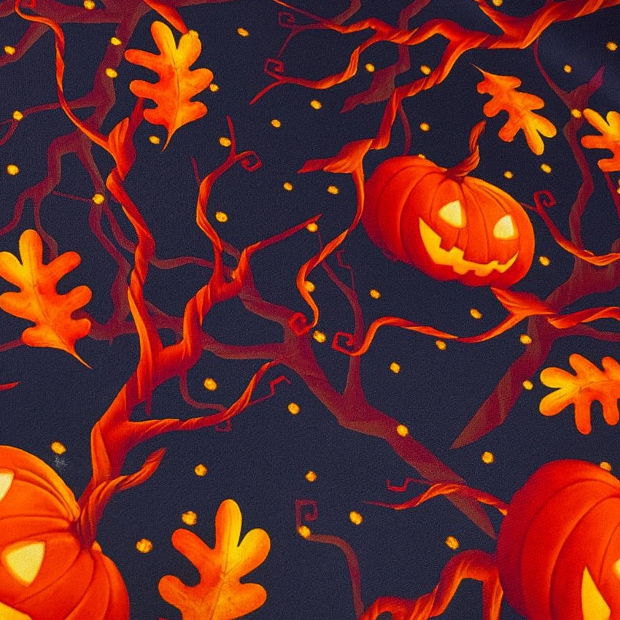 Black Halloween tablecloth with glowing jack-o'-lanterns and oak leaves