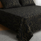 Black gold swirl bedspread with pillows