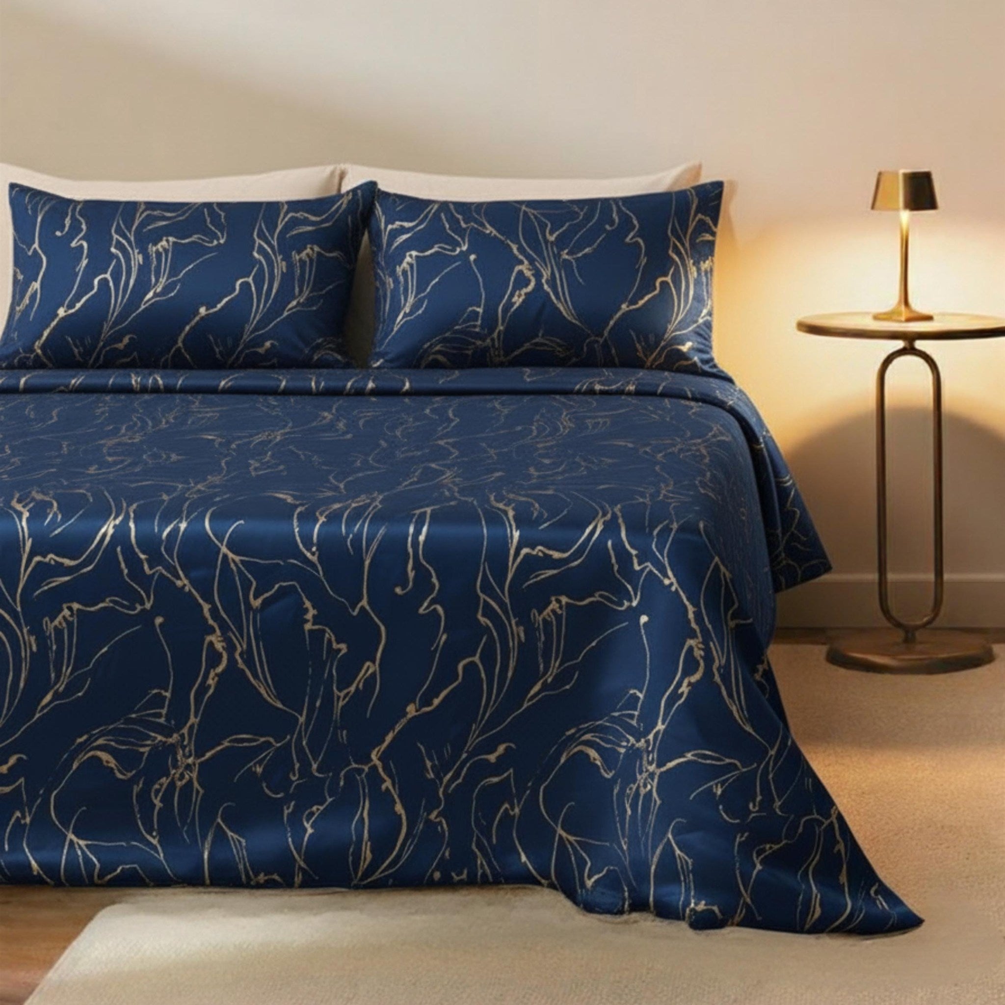 Navy and gold swirl velvet bedspread on a bed