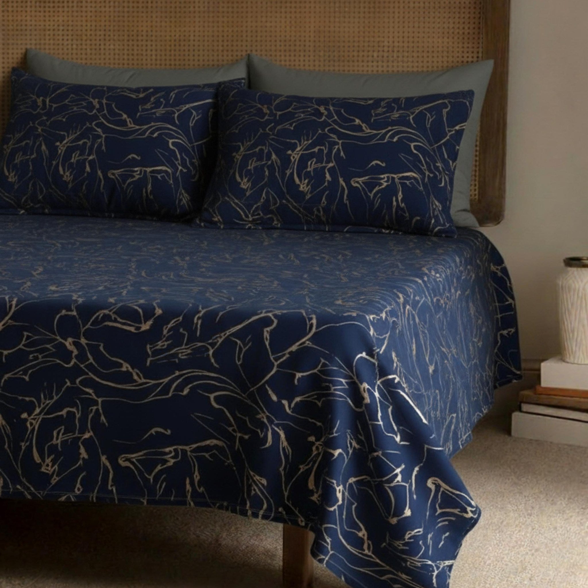 Navy gold bedspread with matching pillows