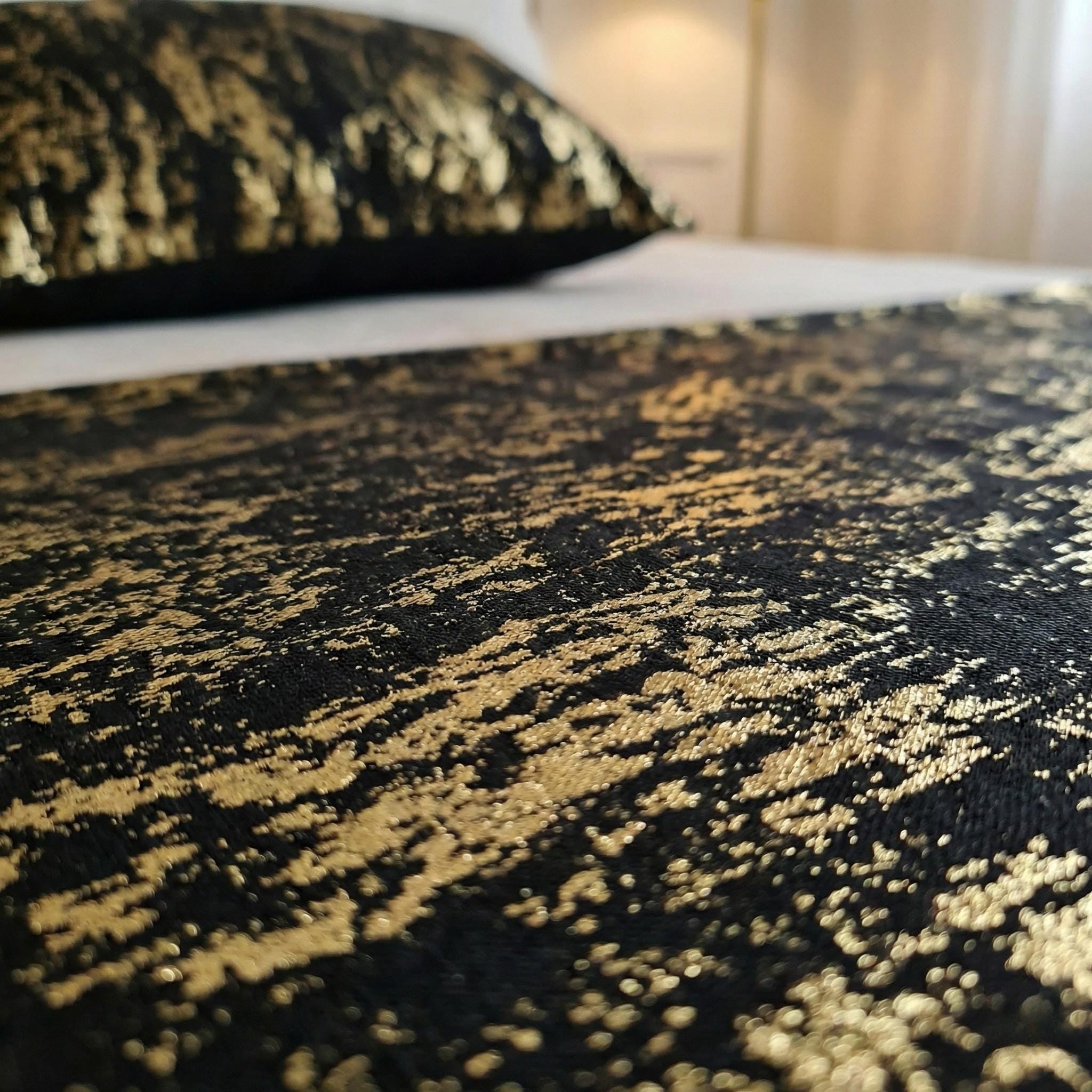 Black gold velvet pattern close-up