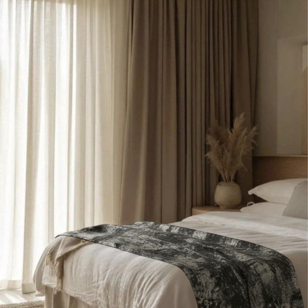 Velvet bed runner in bright bedroom