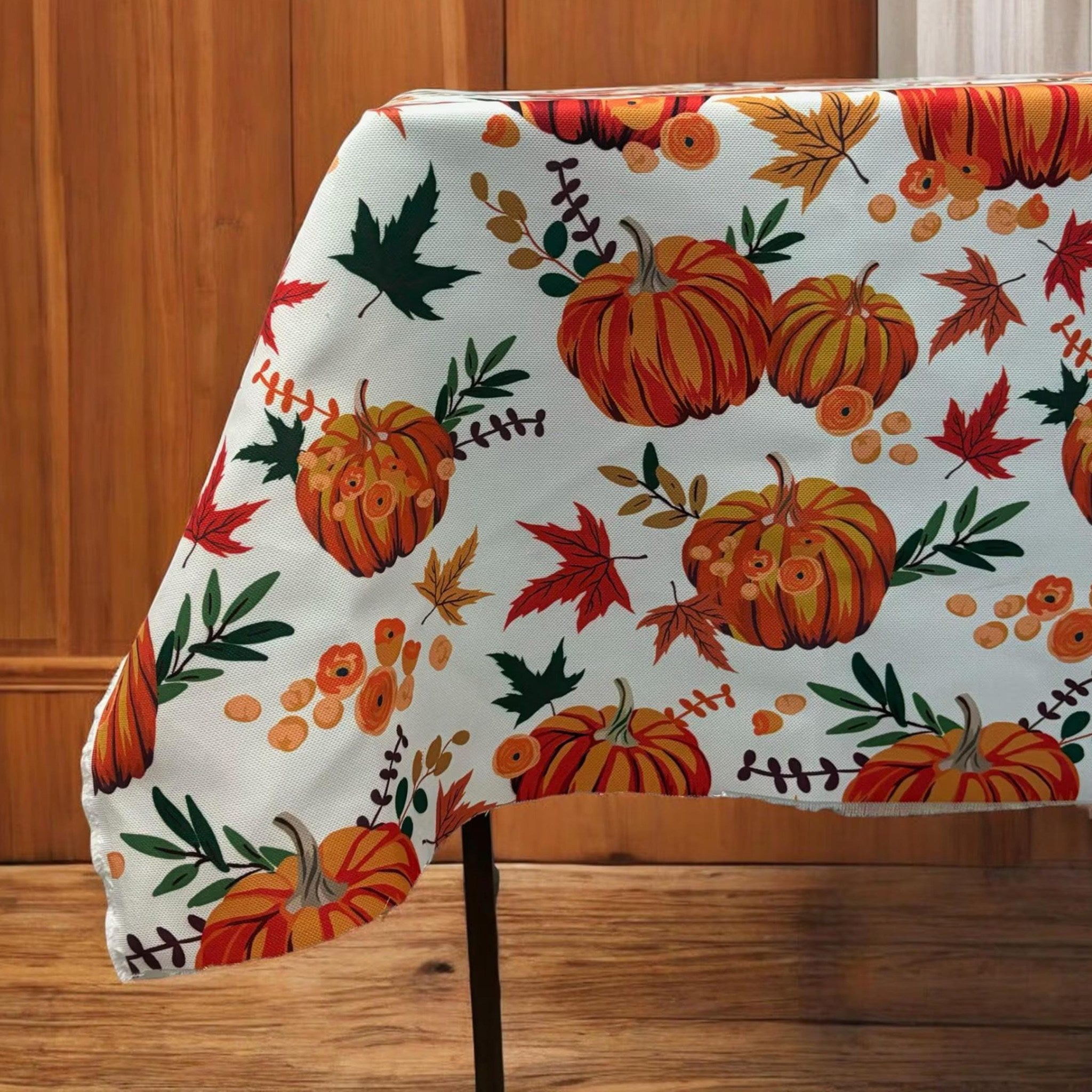 Pumpkin harvest Halloween tablecloth on a dining table