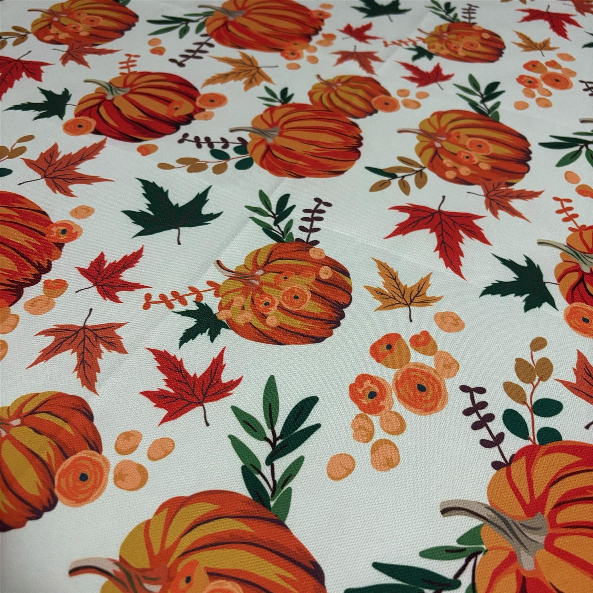 Autumn pumpkin fabric pattern close-up