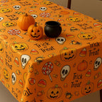 Trick or treat tablecloth with pumpkins and cauldron