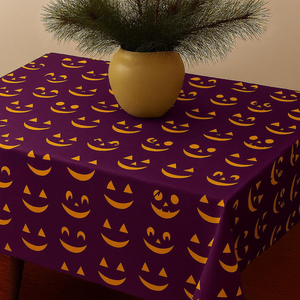 Purple pumpkin face tablecloth with vase styling
