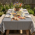 Black and white striped cotton tablecloth on a contemporary dining table