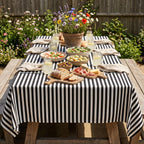 Black and white striped cotton tablecloth on a contemporary dining table