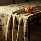 Witch toile tablecloth drape detail with pumpkin