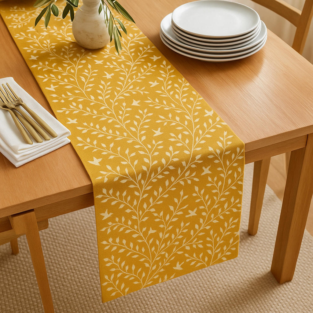 Botanical cotton table runner with plates and cutlery