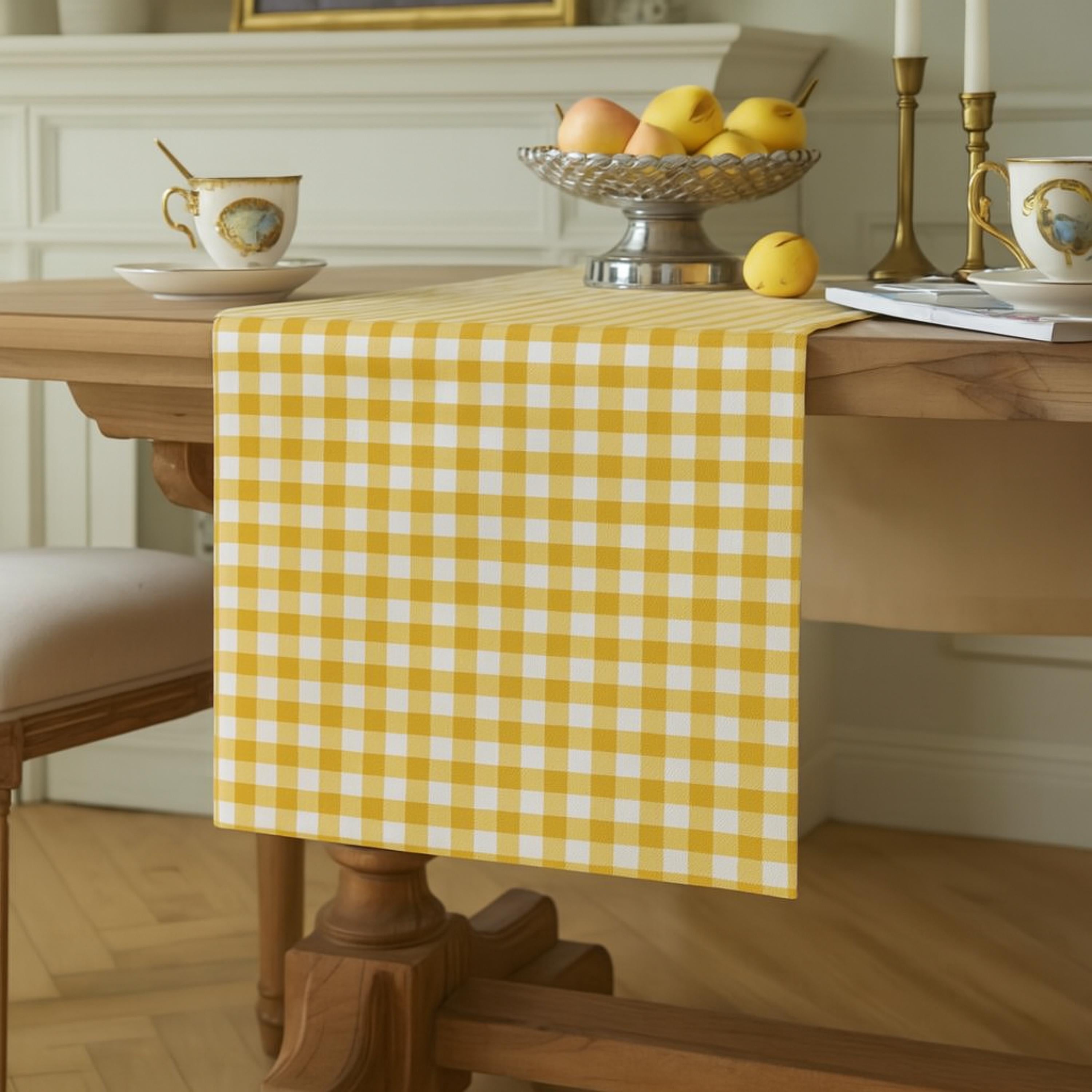 Yellow gingham cotton table runner in classic dining room