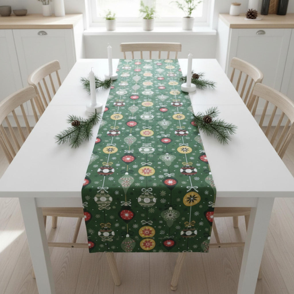 Green Christmas table runner on white table