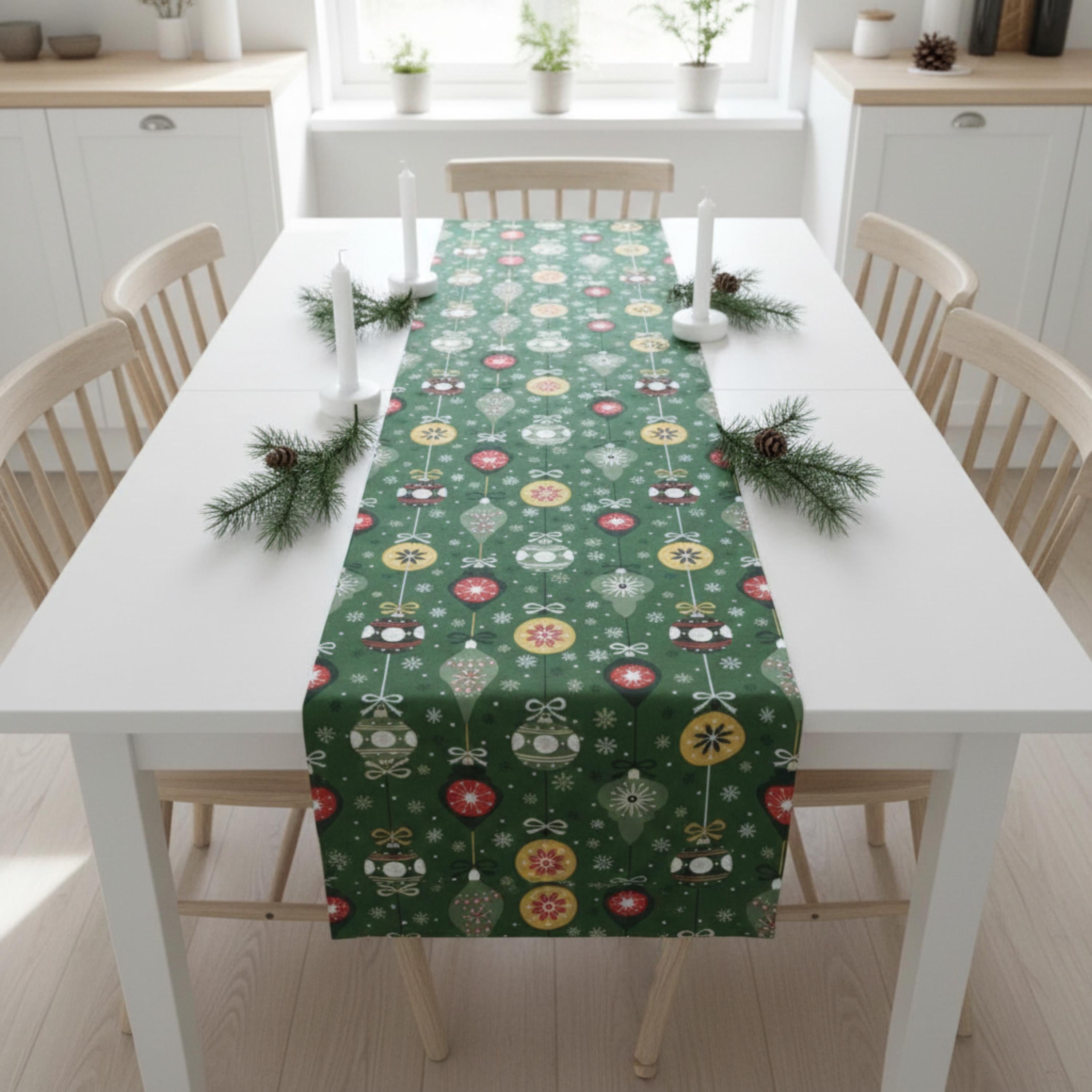 Green Christmas table runner on white table