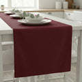 Wine velvet satin table runner in a white kitchen