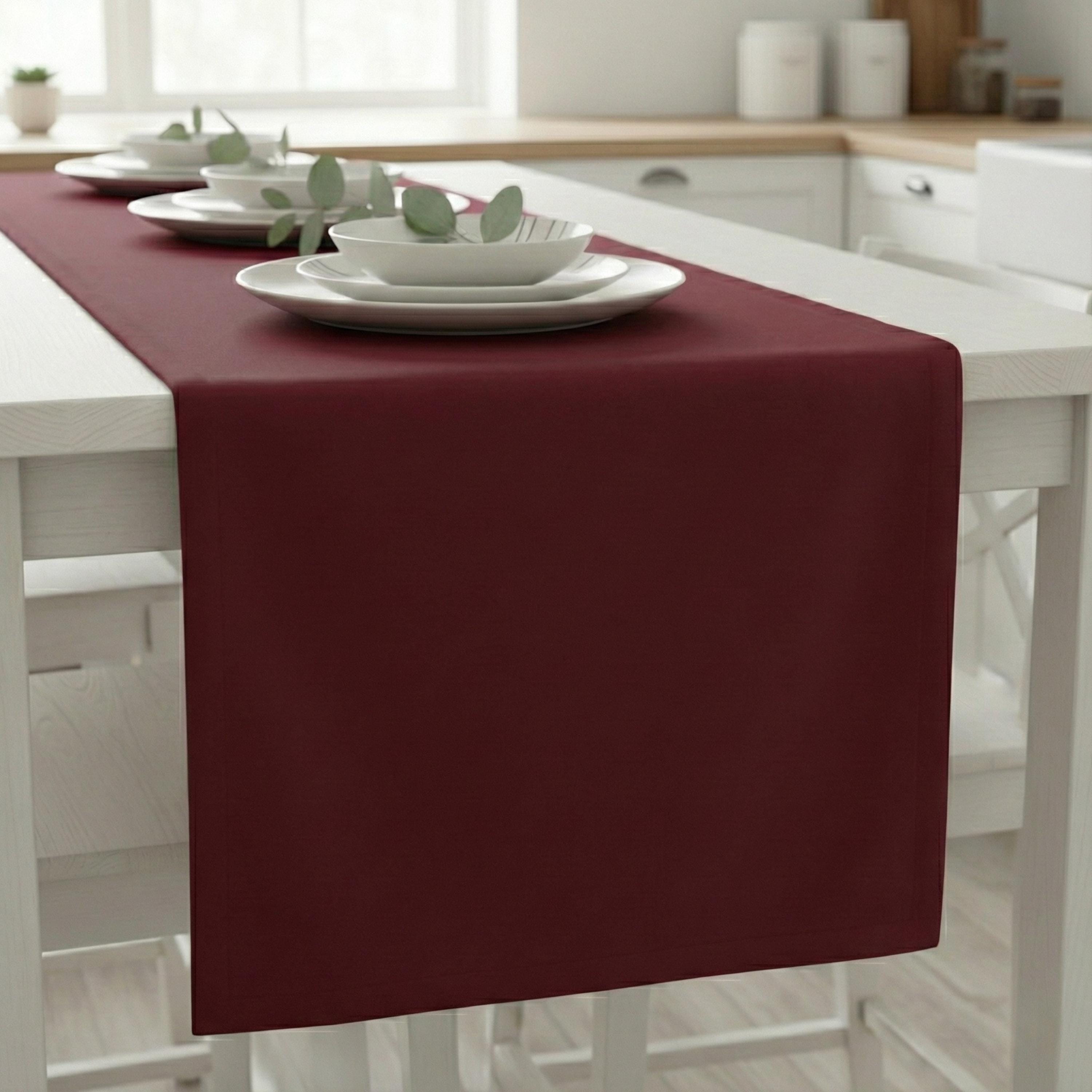 Wine velvet satin table runner in a white kitchen