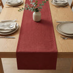 Velvet table runner with vase centerpiece