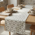 Bone geometric velvet table runner on oak dining table