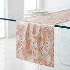 Copper velvet table runner on glass table