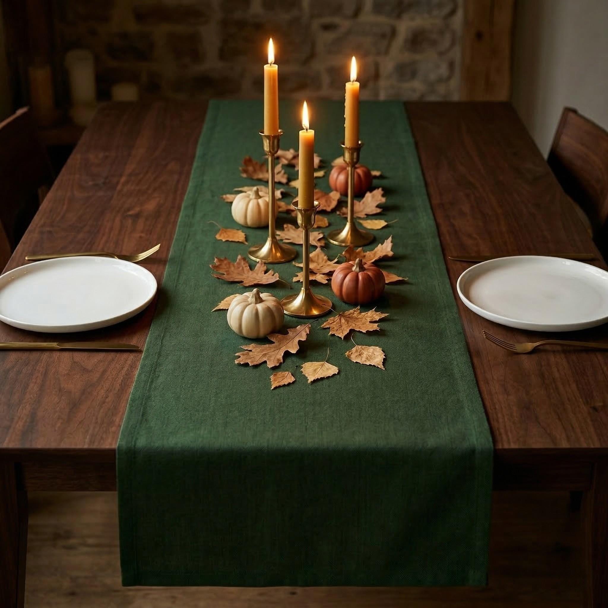 Green linen table runner on dining table