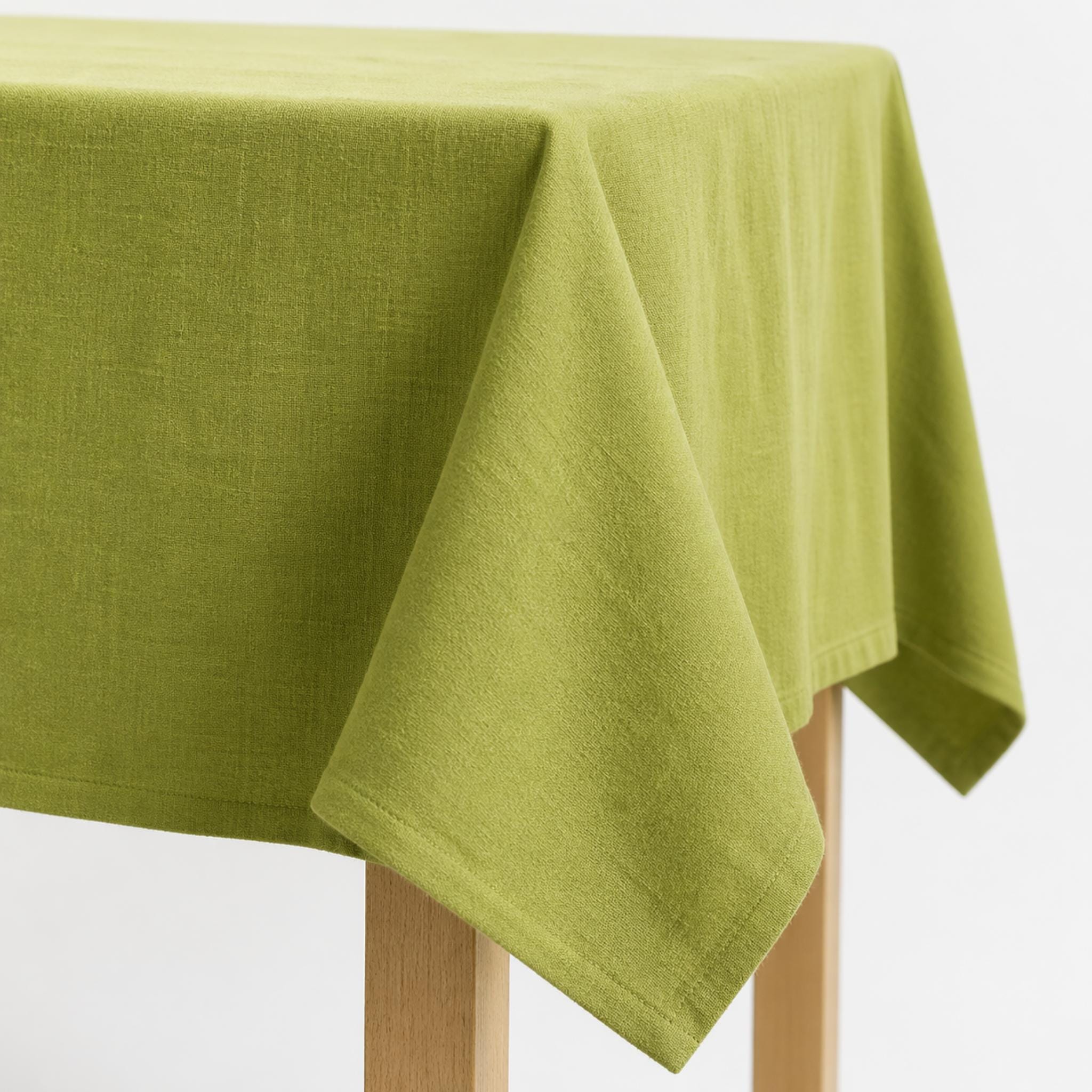 Close-up of lime green tablecloth fabric texture