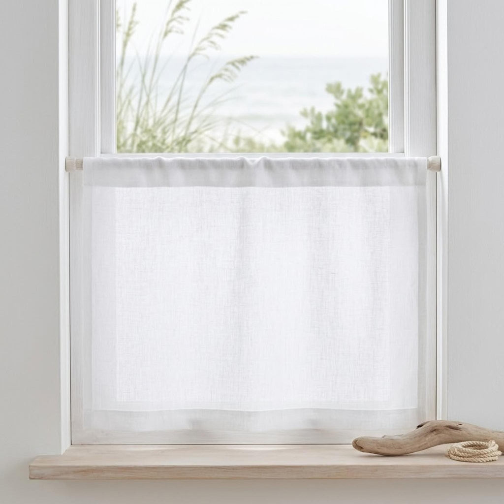 Kitchen window with linen cafe curtain