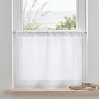 Kitchen window with linen cafe curtain