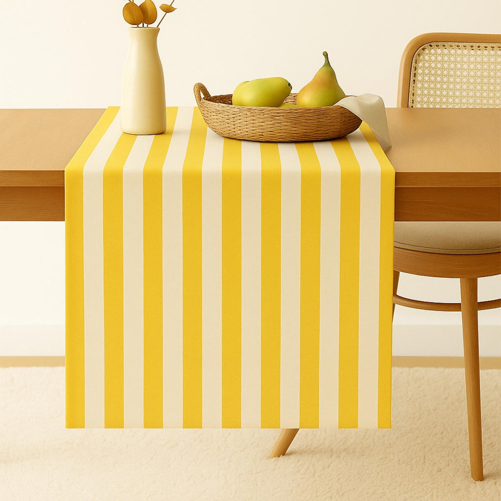 Yellow striped cotton table runner on dining table
