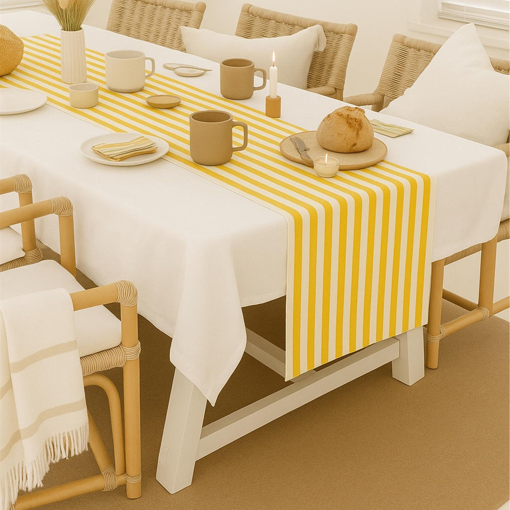 Striped cotton table runner styled with white tablecloth