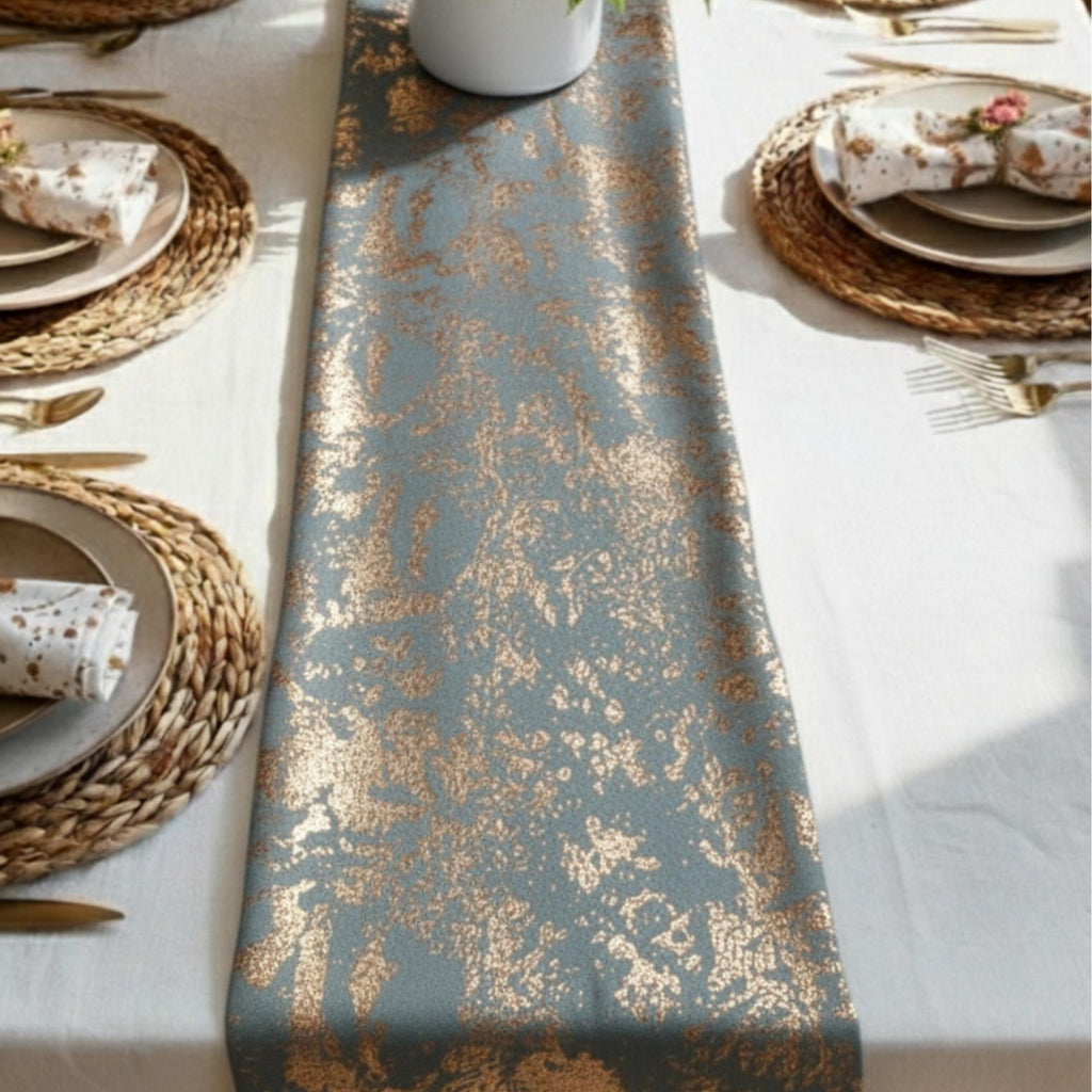 Velvet textured table runner with flower centerpiece